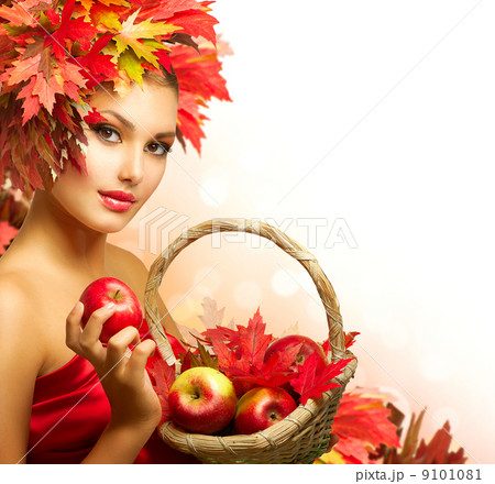 Beauty Autumn Woman with Ripe Red Organic Apples 9101081