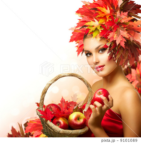 Beauty Autumn Woman with Ripe Red Organic Apples 9101089