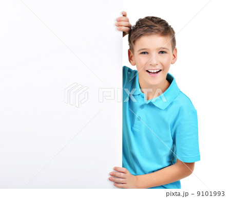smiling  boy looks out from white banner 9101993
