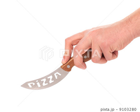Knife for cutting pizza in hand. 9103280