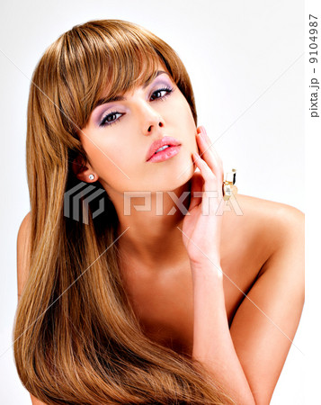 Beautiful indian woman with long straight brown hair Beautiful indian woman with long straight brown hair 9104987