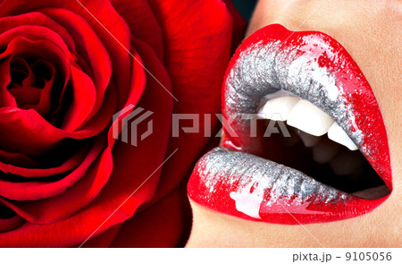 beautiful female lips with shiny lipstick and red rose beautiful female lips with shiny lipstick and red rose 9105056