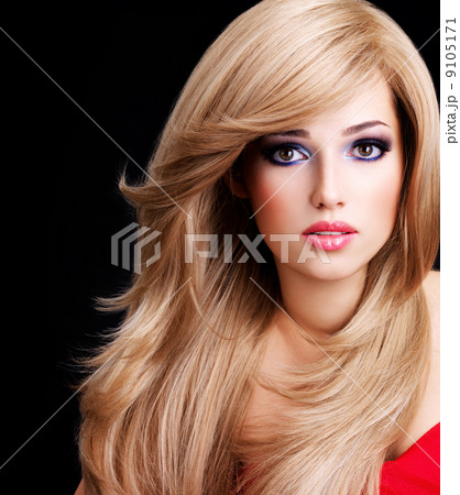 Portrait of a beautiful young woman with long white hairs 9105171