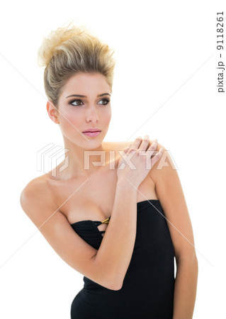 Calm cute blonde model posing for camera 9118261
