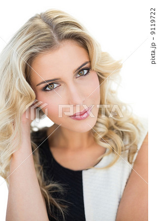 Smiling attractive blonde model looking at camera Smiling attractive blonde model looking at camera 9119722