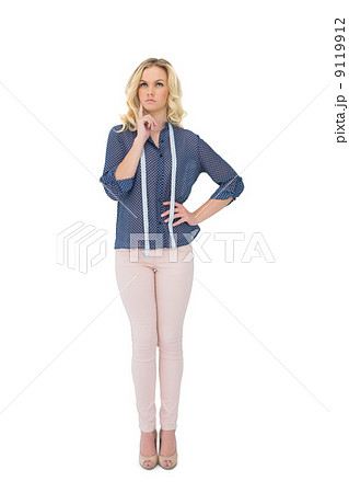 Thoughtful gorgeous fashion designer posing Thoughtful gorgeous fashion designer posing 9119912