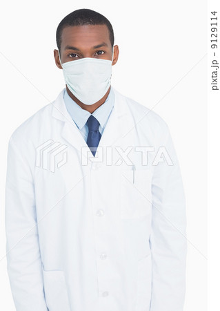 Portrait of a male doctor wearing mask 9129114