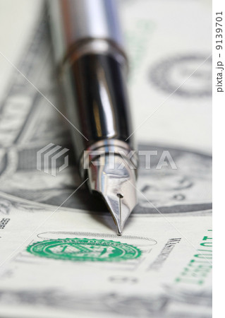 Metal Nib Pen on dollar bill Metal Nib Pen on dollar bill 9139701