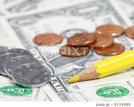 yellow pencil and coin on bill yellow pencil and coin on bill 9139989