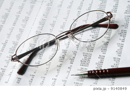 eyeglasses and pencil on document 9140849