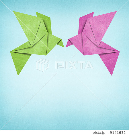 Origami bird made from recycled paper 9141632