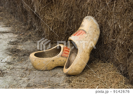 Wooden shoes against a haystack (the Netherlands) Wooden shoes against a haystack (the Netherlands) 9142676
