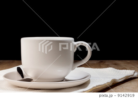 Coffee cup on wooden table 9142919