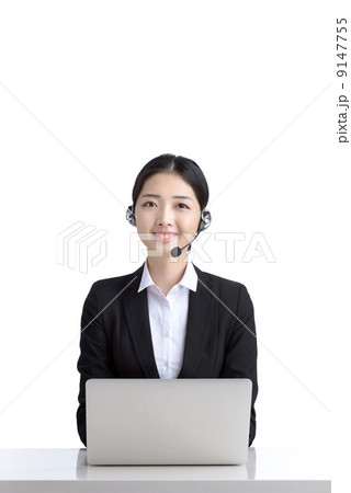 Career woman customer service officer using microphone headset indoor studio white background  9147755