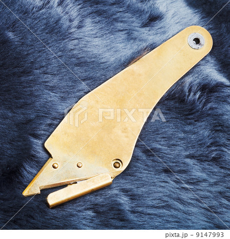 fur knife on sheepskin 9147993
