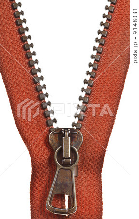 brass orange zip fastener close up 9148031