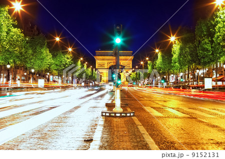 Evening on Champs-Elysees in front of Arc de Triomphe.Paris. Fra 9152131