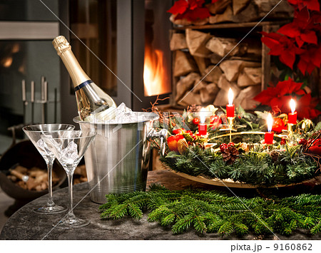 bottle of champagne, glasses and fireplace bottle of champagne, glasses and fireplace 9160862