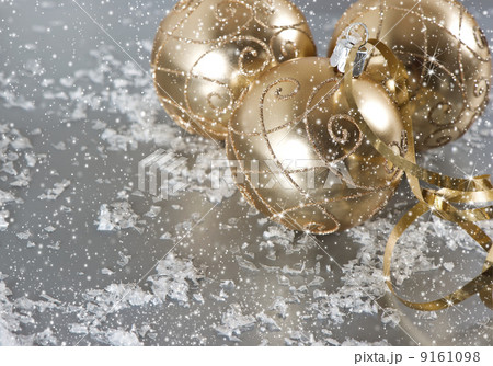 golden christmas balls with snow decoration golden christmas balls with snow decoration 9161098