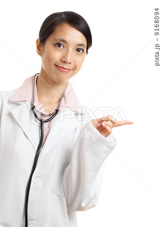 Asian doctor pointing a side Asian doctor pointing a side 9168094