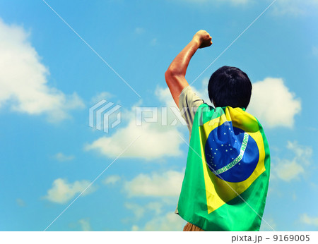 Excited man holding a brazil flag Excited man holding a brazil flag 9169005