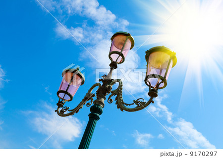 old street-lamp on blue sky with sunlight in Venice old street-lamp on blue sky with sunlight in Venice 9170297