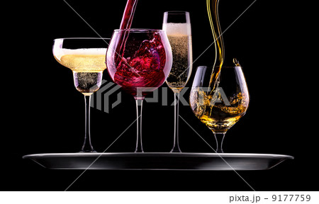 set with different drinks on black background 9177759