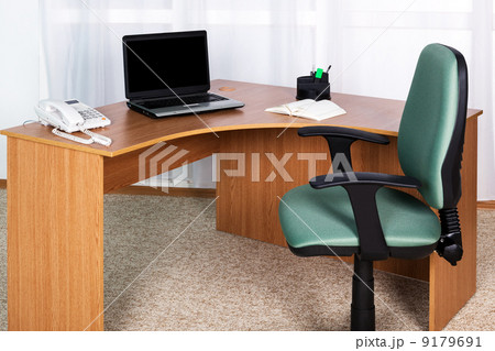 laptop on a desk laptop on a desk 9179691