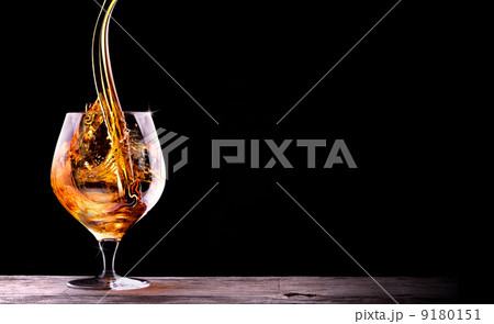 Cognac or brandy on a black Cognac or brandy on a black 9180151