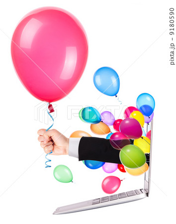 hand with a gift and laptop 9180590