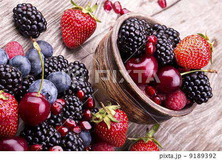 tasty summer fruits on a wooden table tasty summer fruits on a wooden table 9189392