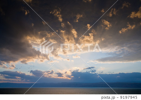 dark yellow sunset on Dead Sea dark yellow sunset on Dead Sea 9197945