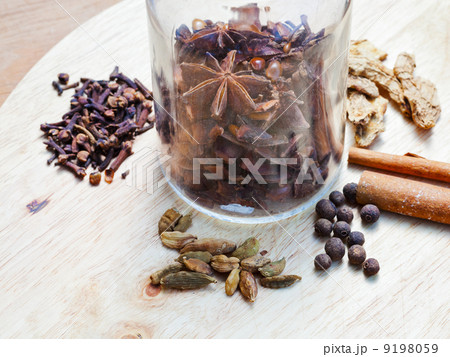 glass bottle with set of spices 9198059