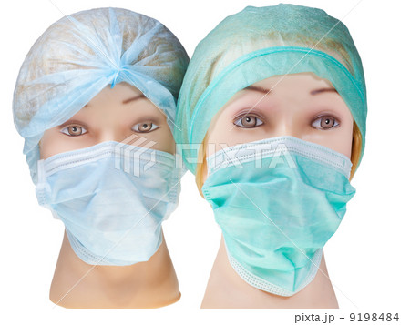 dummy doctor head wearing textile surgical cap and mask 9198484