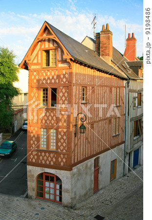 old narrow corner timber framing house 9198486