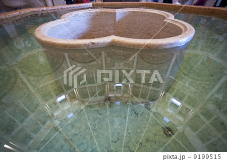 font-stone with water in The Baptistery of Parma 9199515