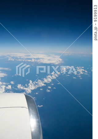 clouds under wing of airplane clouds under wing of airplane 9199913