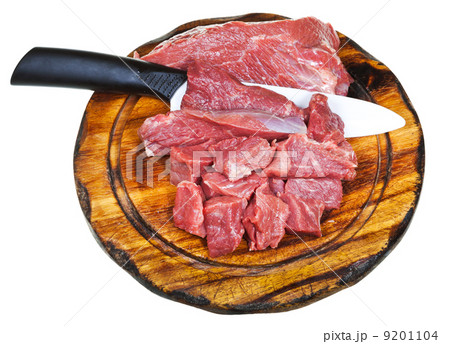 top view of cut raw meat on wooden board 9201104