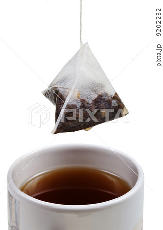 tea bag over brewing tea in cup 9202232