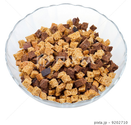dried rye bread crust pieces in glass bowl 9202710