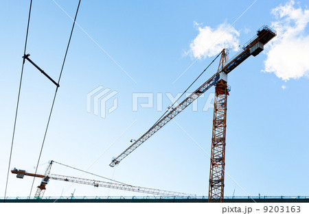 industrial crane under blue sky 9203163
