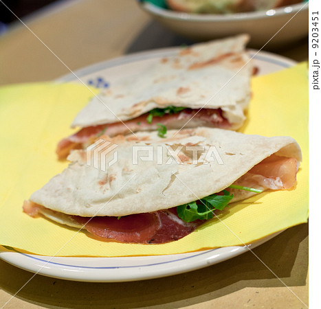 italian sandwich - piadina romagnola with prosciutto crudo italian sandwich - piadina romagnola with prosciutto crudo 9203451
