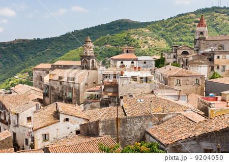 view on ancient tile roofs and tower of Sant Antonio church in Castiglione di Sicilia 9204050