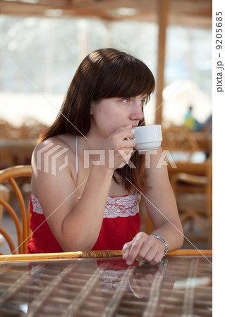Woman in resort cafe 9205685