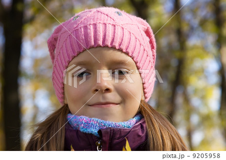 Portrait of girl in knitted cap 9205958