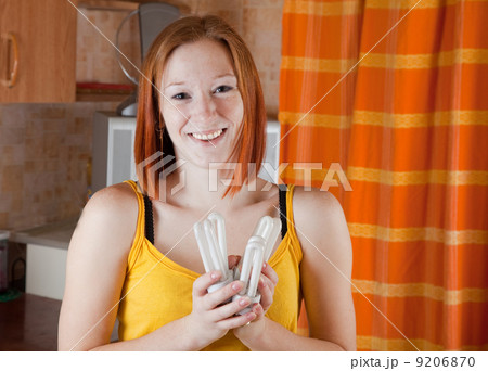 Woman with armful of bulbs Woman with armful of bulbs 9206870