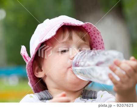 2 years baby drinks from bottle 9207625