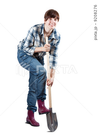 woman spading with spade over white woman spading with spade over white 9208276