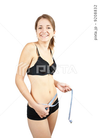 Girl measuring waist Girl measuring waist 9208832