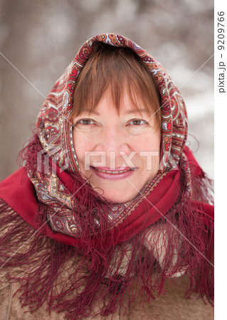 portrait of mature woman in babushka 9209766